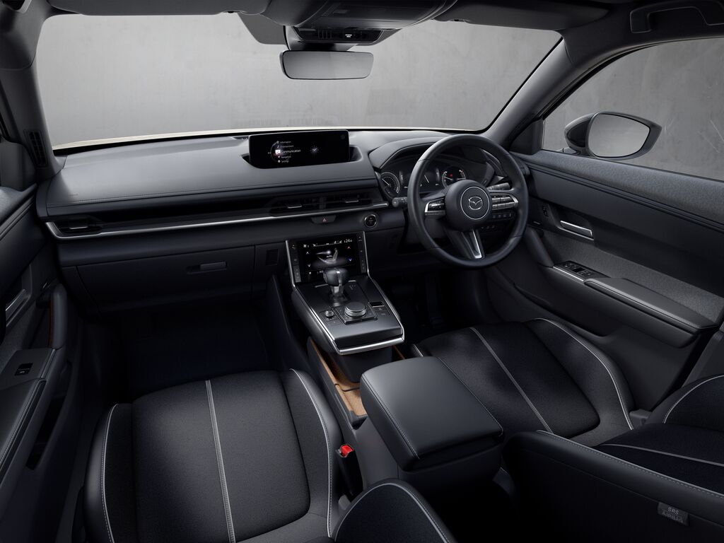 Medium 2022 MX 30 IPM1 UK RHD STD C111B BEV INT Passenger View Black